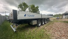 Полуприцеп бортовой Тонар B3-13 9888 — задняя часть и боковой борт