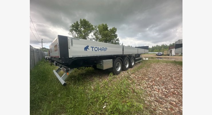 Полуприцеп бортовой Тонар B3-13 9888 — задняя часть и боковой борт